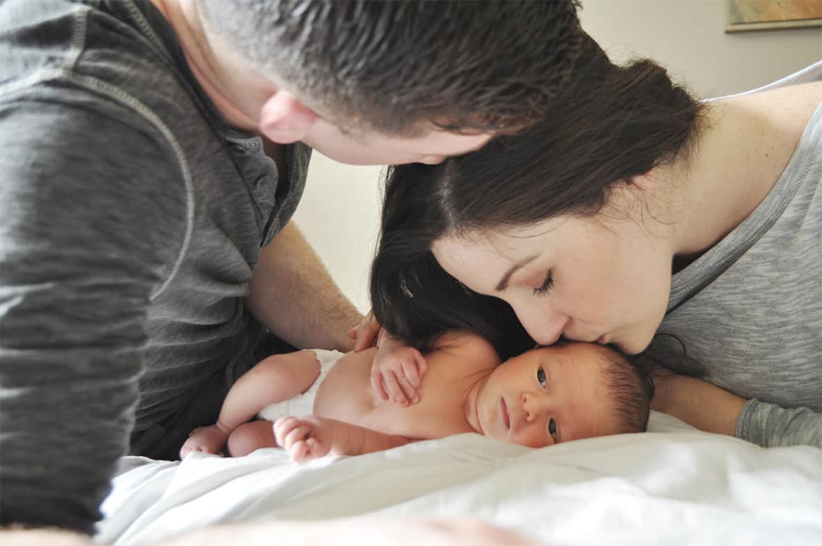 The Birthing Inn - newborn baby with loving parents